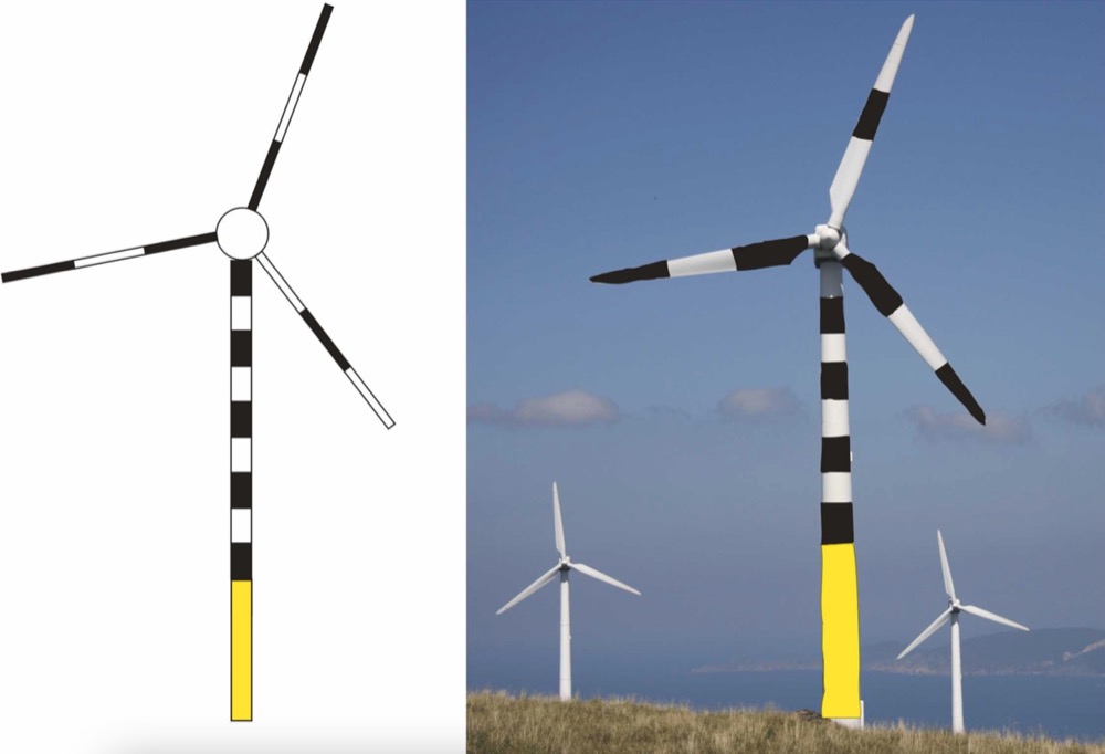 白と黒に塗られた風力発電機のイメージ