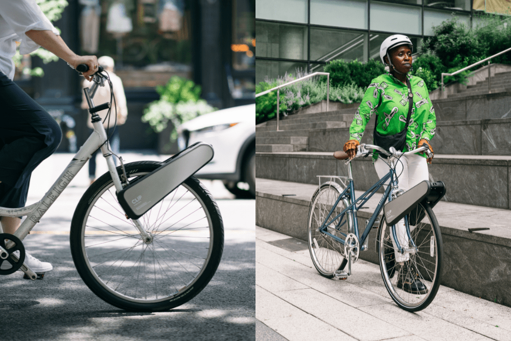 自転車の前輪を、前方から大きな楕円形のクリップが挟んである様子